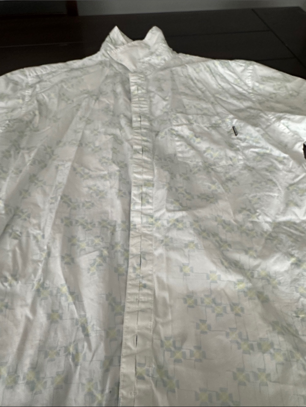 Oakley Men's White Button-Up Shirt with Subtle Geometric Print